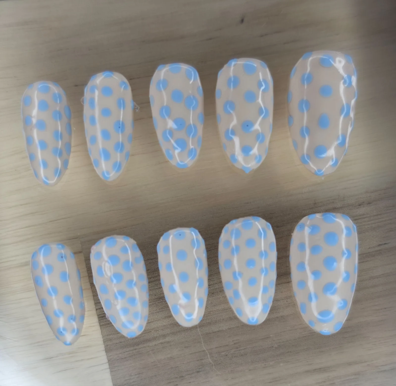 Blue and yellow patterned nails