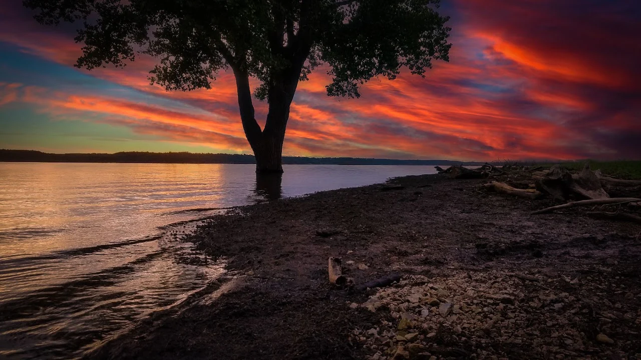 An edited sunset over the lake